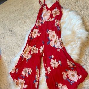 Forever 21 large floral romper jumpsuit red. Good preowned. Vacation outfit.